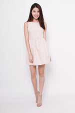 Load image into Gallery viewer, Vera Quilt Embossed Skater Dress in Nude
