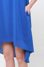 Load image into Gallery viewer, Klara V Back Dip Hem Trapeze Dress in Blue
