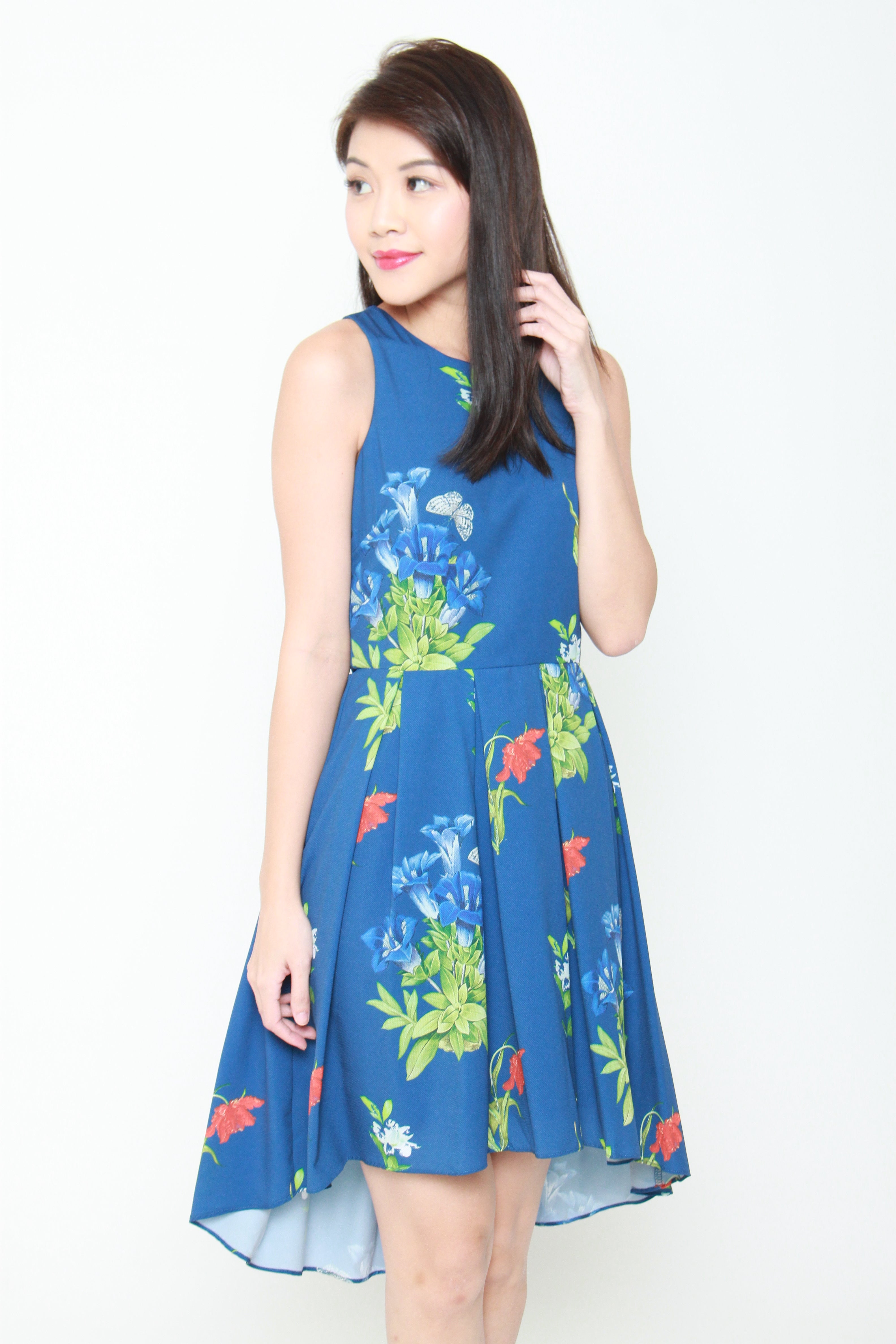 Andrea Floral Dip Hem Dress in Blue