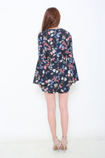 Load image into Gallery viewer, Lyric Floral Bell Sleeve Romper in Navy Blue
